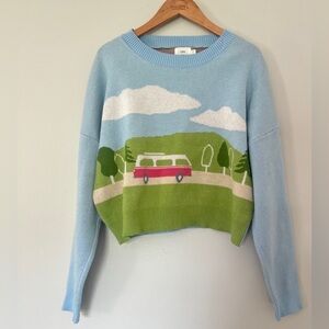 Scenic Blue Sweater with Green Landscape Design